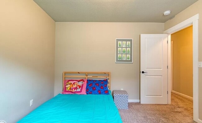 Building Photo - 3 bedroom Home Covered Patio home has AC !!!
