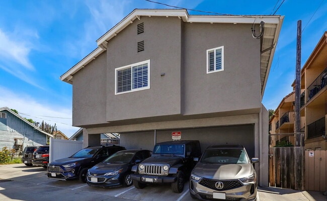 Building Photo - This quaint, gated complex is located on a...