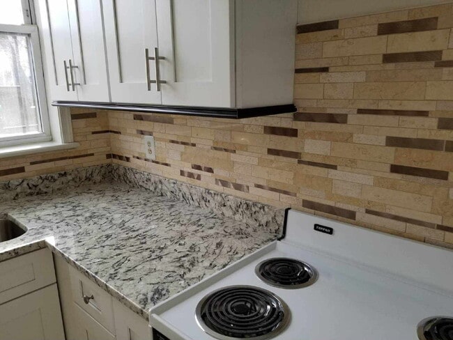 Building Photo - Sophisticated NW DC Home Featuring 3 Bedrooms, Fireplace & Outdoor Oasis with Private Parking