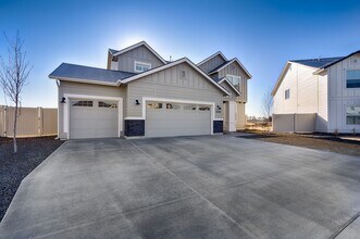 Building Photo - Custom Hunter-Douglas shutters throughout.