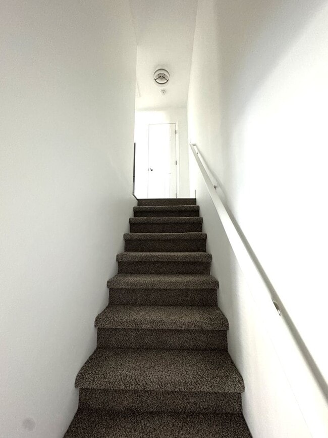 Building Photo - Completely Remodeled 2BR/1.5BA Townhome – City Convenience!