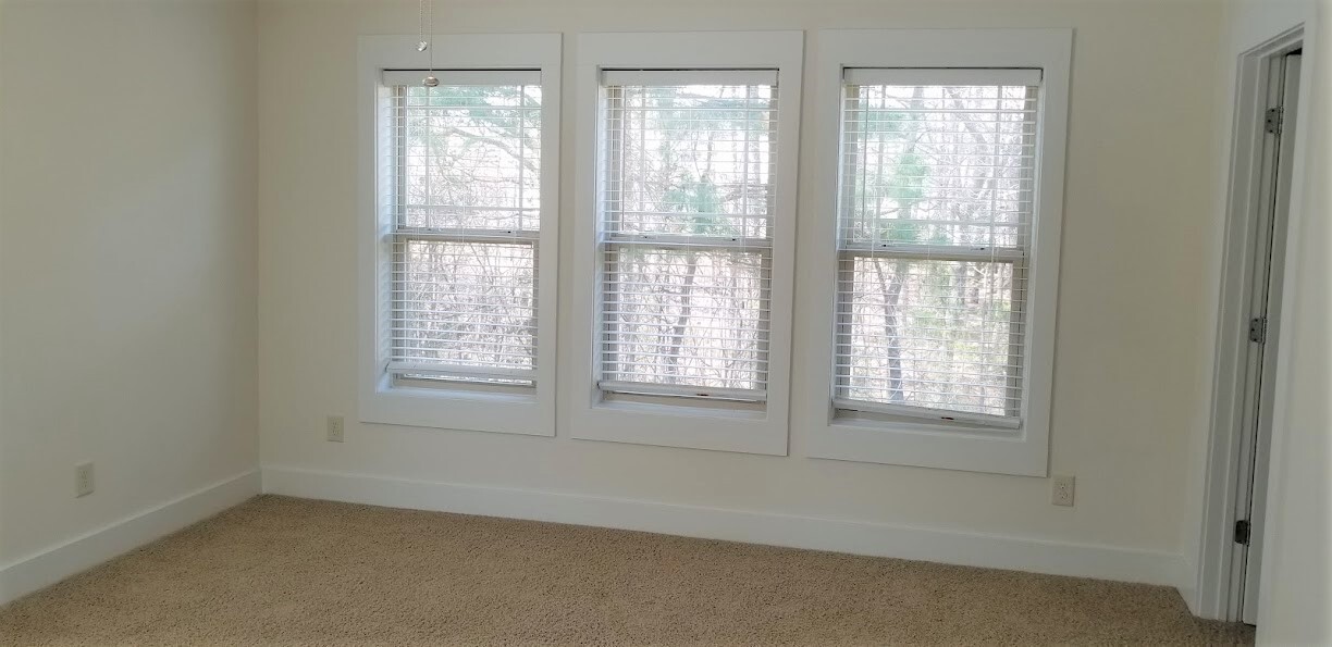 master bedroom with 3 windows - 2924 New Hill Park Rd