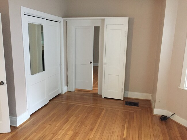 Hardwood floors continue throughout the master bed room. - 4501 Walter Ave