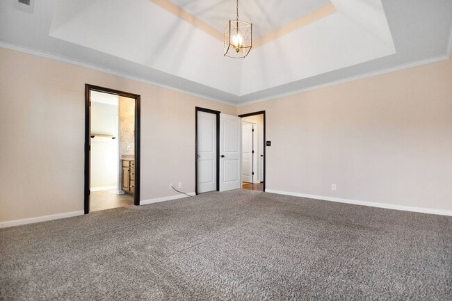 Building Photo - Pet Friendly Three Bedroom with Bonus!