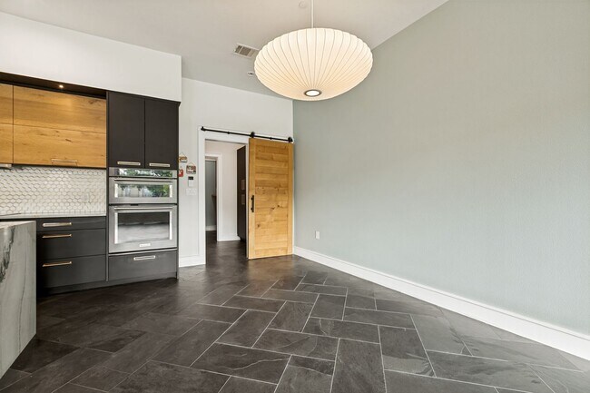 Building Photo - LUXURY TOWNHOME IN LONE STAR DISTRICT