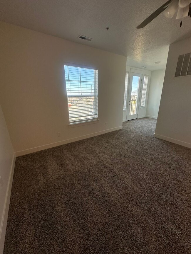 Building Photo - Brand New 3 Bed Condo with Resort-Style Amenities & Included Internet!