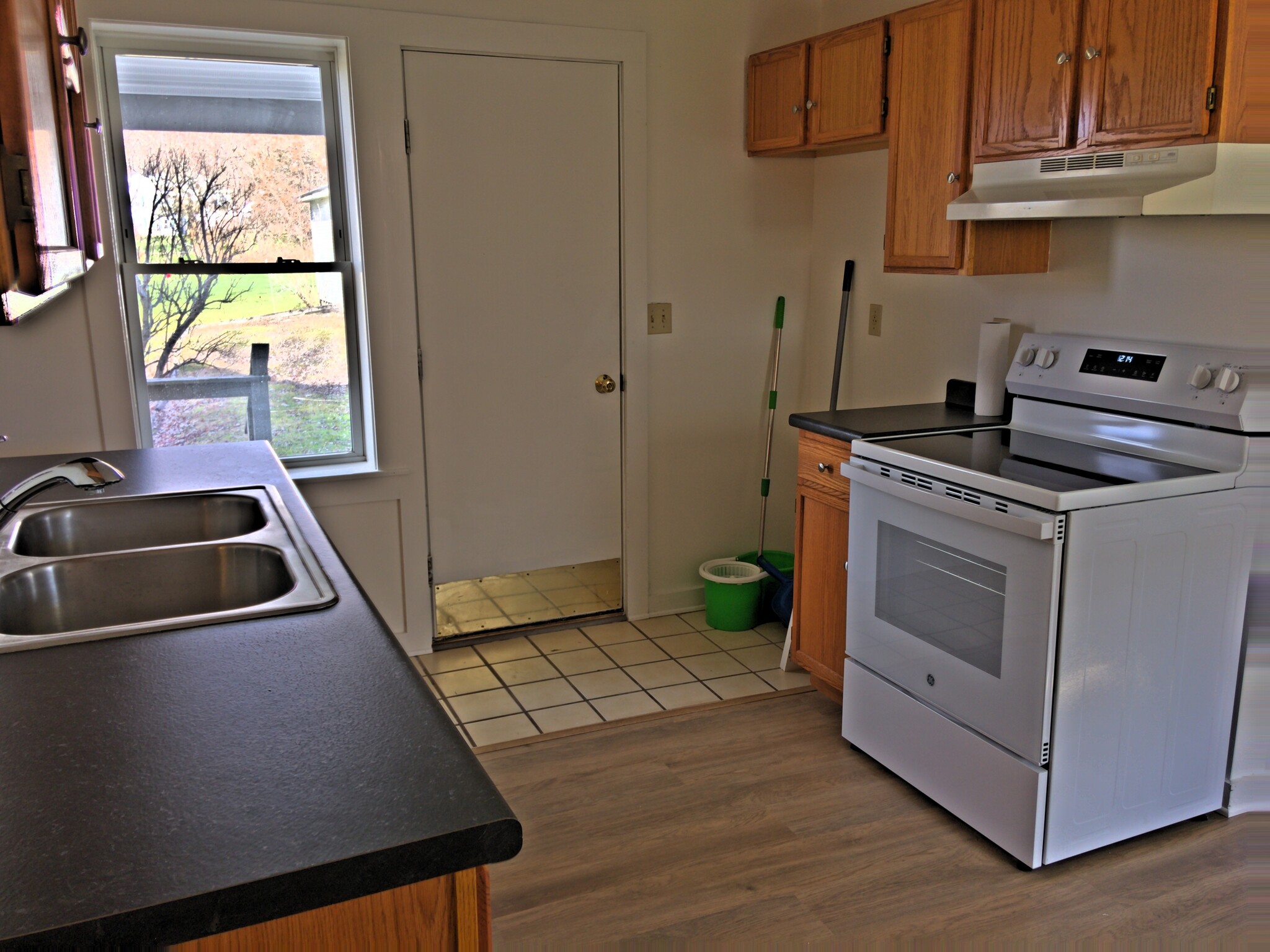 Kitchen with door to back porch - 11035 Route 116