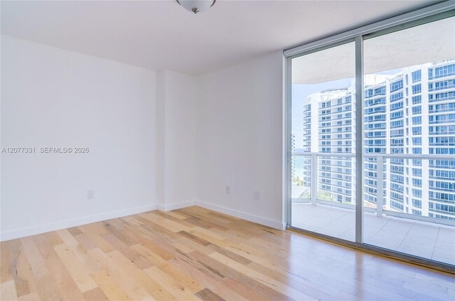 Building Photo - 5900 Collins Ave