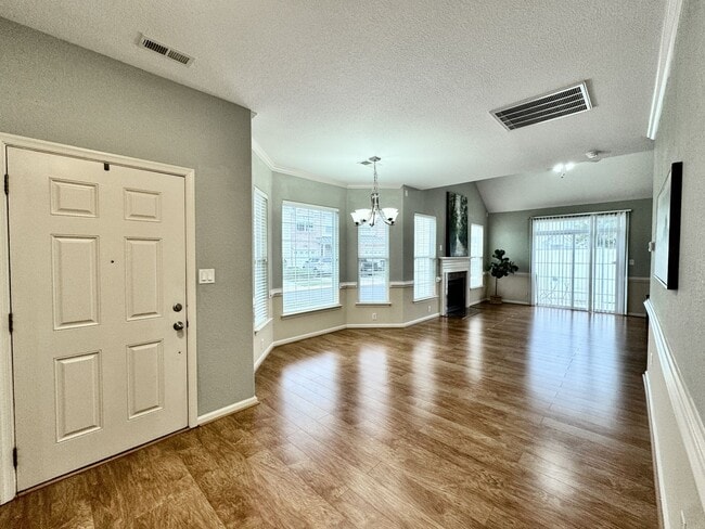 Building Photo - READY NOW!! End-Unit Loft-Style Condo w/1s...
