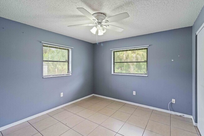 Building Photo - "Charming 2-Bedroom Duplex in Port Charlot...