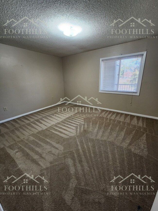 Building Photo - Bright 2-Bed, 2-Bath Condo Near Darwin Wri...