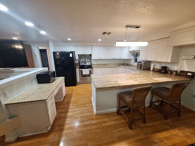 Building Photo - Gulf Access Home on Canal Available Now