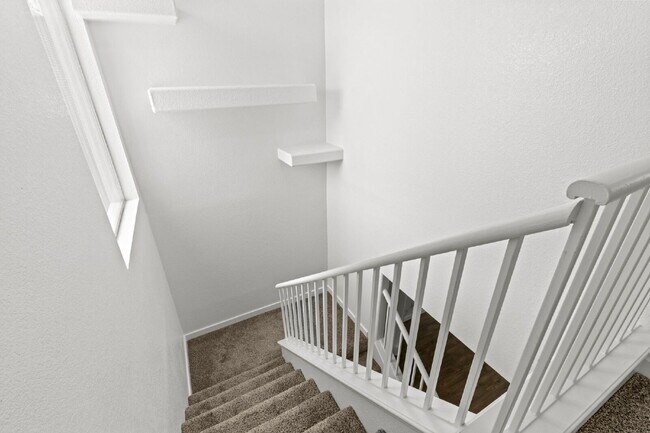 Building Photo - "Charming 3-Bedroom Townhouse Oasis with 2 Full Baths in Las Vegas – 1220 Sq Ft of Comfortable Li...