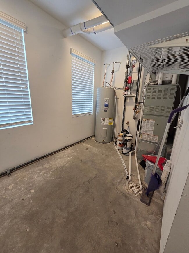 Building Photo - STUNNING 4-LEVEL TOWNHOME IN HIGHLANDS WITH SAUNA, 2-CAR GARAGE + AMAZING ROOFTOP DECK!