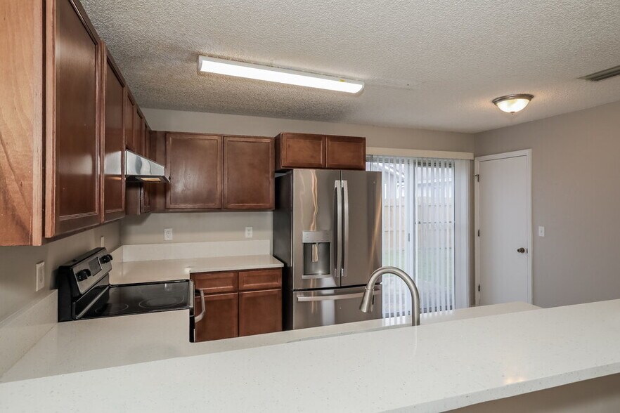 Building Photo - 7939 Cherry Blossom Dr S