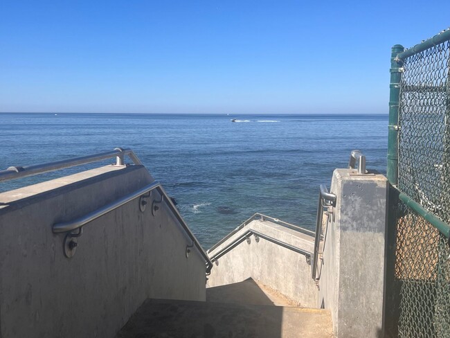 Building Photo - OCEAN EDGE , Steps from the beach ! Garage...