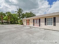 Building Photo - 516 13th Pl