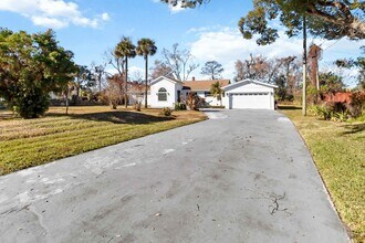 Building Photo - 4/3 Lakefront Home for Rent – 1 Acre – Near College Park & Downtown Orlando