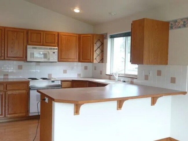 Building Photo - Welcome to Your Next Home in One of Spokan...