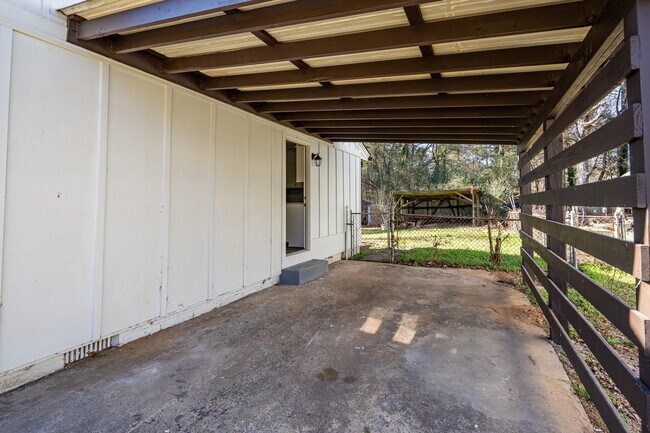 Building Photo - The Forest Haven | Large Forest Haven home with a spacious yard and deck, conveniently located ju...