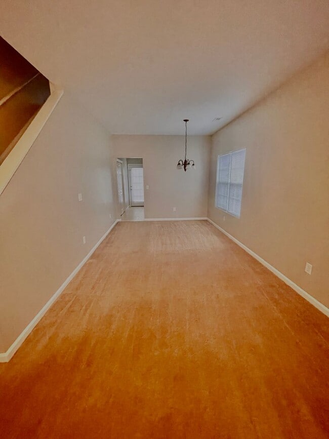 Building Photo - This two-story, 4-bedroom, 2-bath duplex in Fort Mill, SC sits on a corner lot