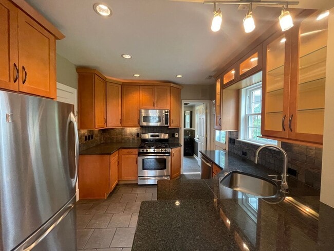 Building Photo - Charming Brick Cape in Colonial Place