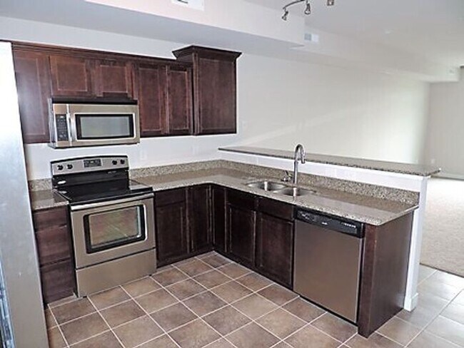 Building Photo - $2,000 | 3 Bedroom, 3 Bathroom Townhome | Pet Friendly | Available for August 1st, 2026 Move In!