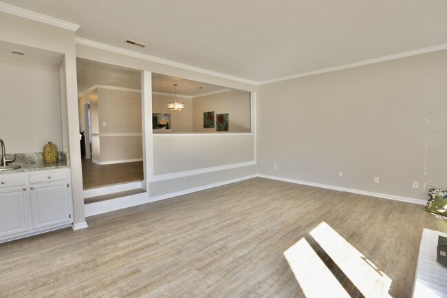 Building Photo - Updated End-Unit Brick Townhome Ready NOW!...