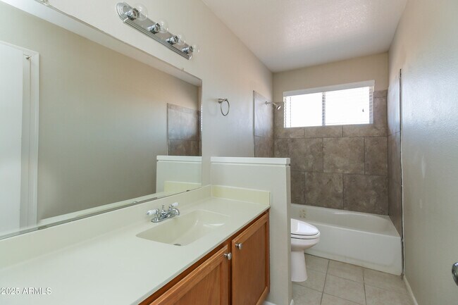 Building Photo - 1033 N Arvada