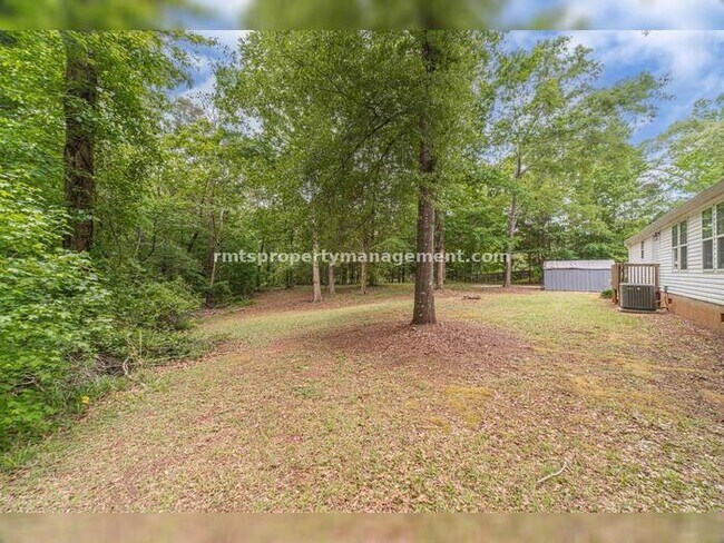 Building Photo - A COUNTRY DREAM! 4BR, 2BATH MANUFACTURED HOME, $1650./month