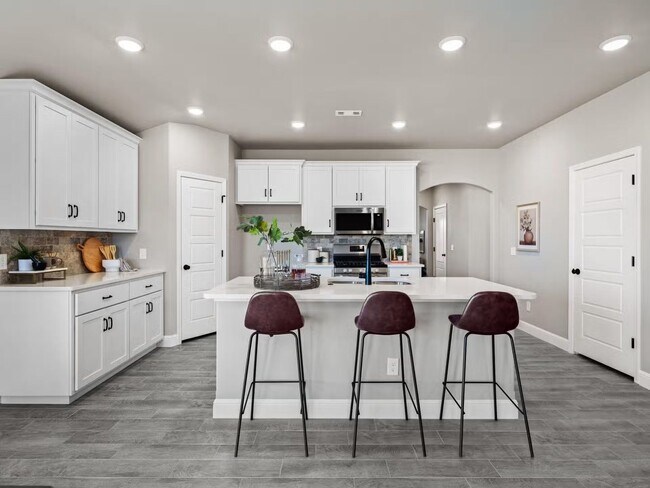 Building Photo - New Beginnings Start At AMRR: 4 bedroom / 2 bath in Apple Crossing!