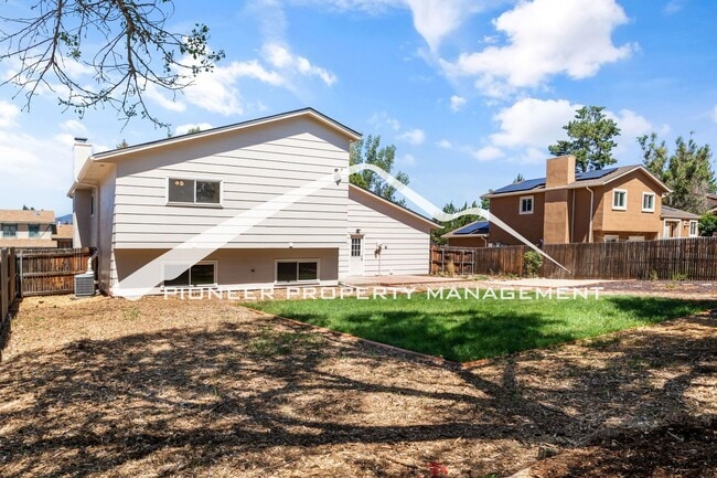 Building Photo - Updated 4 Bed, 2 Bath Home in Briargate with Mountain Views, fully fenced yard, 2 car garage and AC