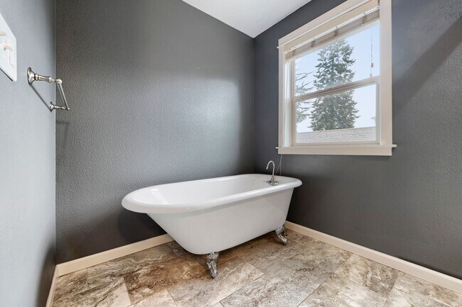 Building Photo - Custom-Built 4BR/2.5BA Two-Story Near Woodstock — Quartz Island Kitchen, Gas Fireplace & Fenced Y...