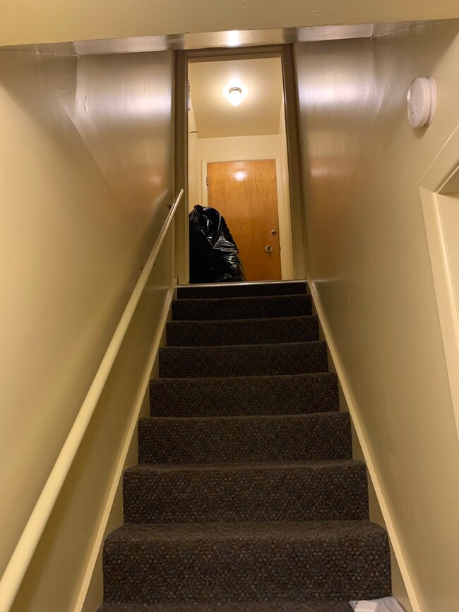 Stairs leading down to the apartment - 512 29th Ave NE