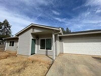 Building Photo - 2 bedroom 2 bath, With garage and fenced yard