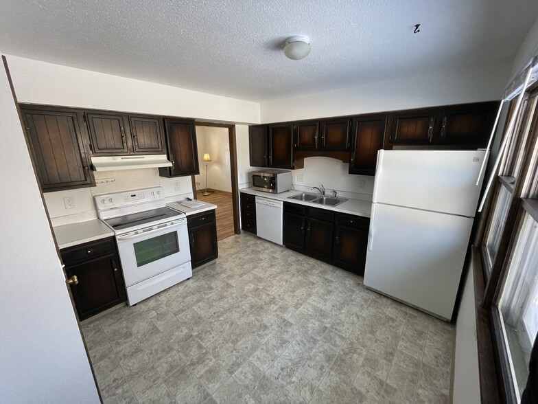 Kitchen includes a dishwasher - 715 Westgate St