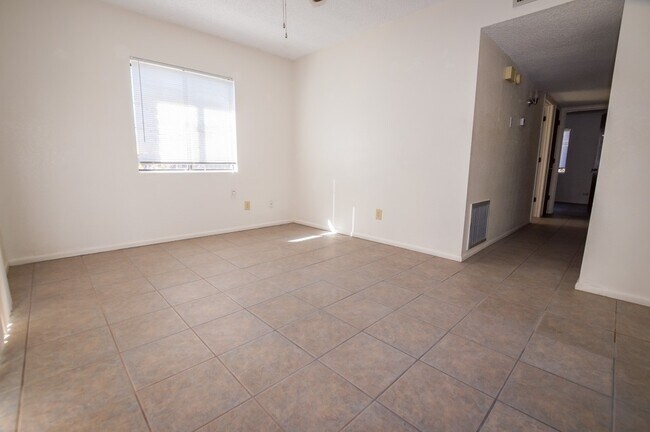 Building Photo - Welcome to this delightful 3-bedroom, 2-ba...