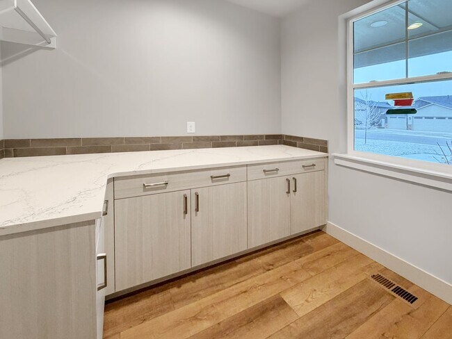 Building Photo - Brand New 4-Bedroom Home in Pheasant Meadows with 3-Car Garage Near Shopping and Dining