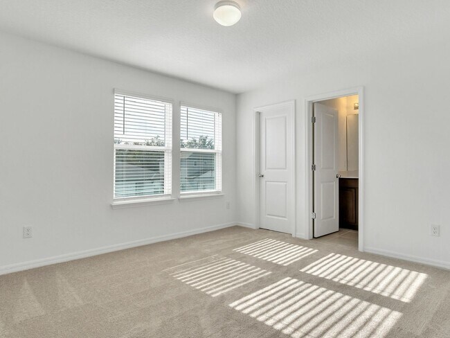 Building Photo - Stunning 4-Bedroom Home with Pond Views in...