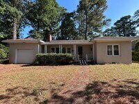 Building Photo - Stylish Ranch home with Expansive Yard in ...