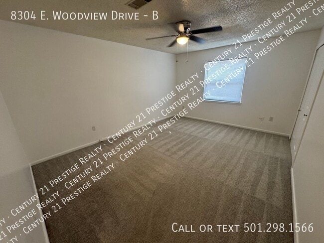 Building Photo - 8304 Woodview Dr N