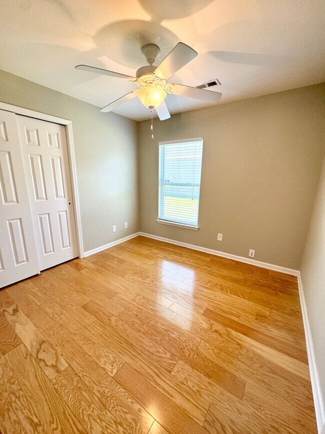 Building Photo - Like New 3 Bedroom & 2 Bath pond front home in Hillsborough! Enjoy the Community Pool, Playground...