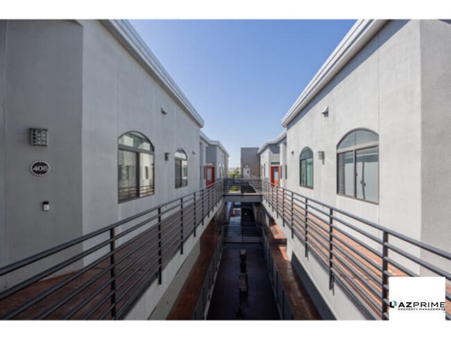 Building Photo - Top-floor living meets modern charm in thi...