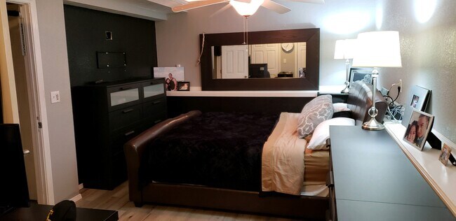 Since this picture, a 52" LED smart TV has been installed above the dressors. - 3916 Bluebell Dr.