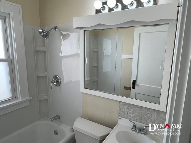 Building Photo - Updated 4+ Bedroom, 2 Bathroom House with Garage and Fenced Backyard