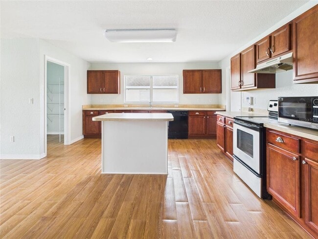 Building Photo - 9875 SW 55th Ct