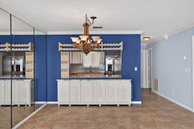 Building Photo - Gulf Access 2 bedroom 2 Bath Fully updated Condo with Water View