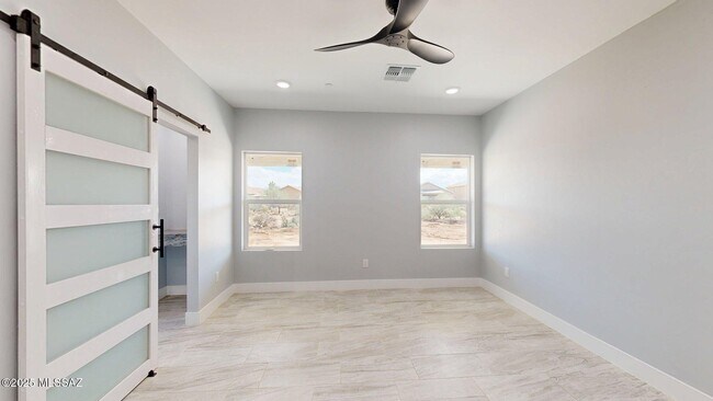 Building Photo - 7095 W Los Reales Rd