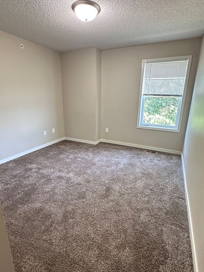 Building Photo - Champlin Corner Unit Town Home, 2 Car Garage, Dishwasher, Washer/Dryer, Balcony