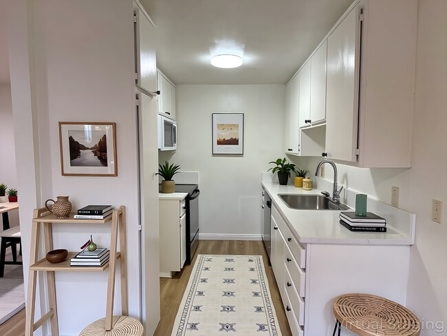 Building Photo - 10140 Mountair Ave